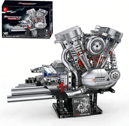 Brick-built V-twin motorcycle engine with visible moving pistons