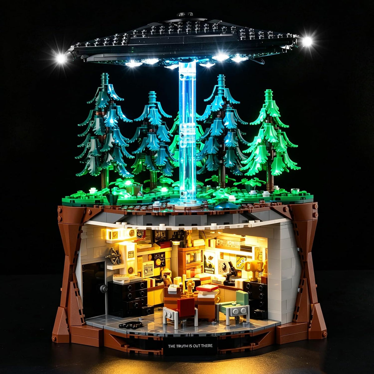 Lit two-level sci-fi office brick model with glowing rooms and desk lamps