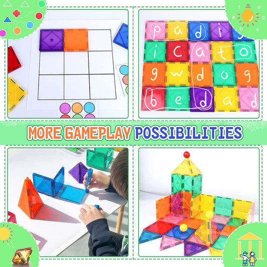 Magnetic tile construction scene with two cranes, road pieces and a toy train