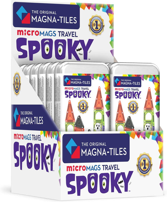 Mini magnetic tiles in lime, orange, purple and black built into a haunted house