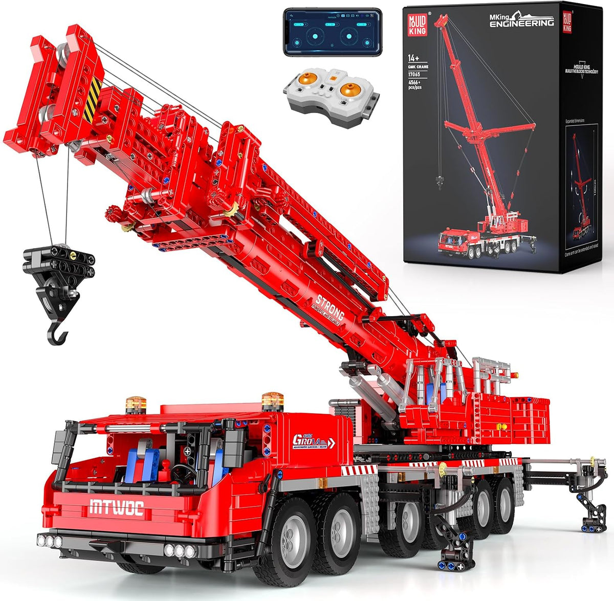 Large brick-built yellow mobile crane with extended arm and stabilizer legs