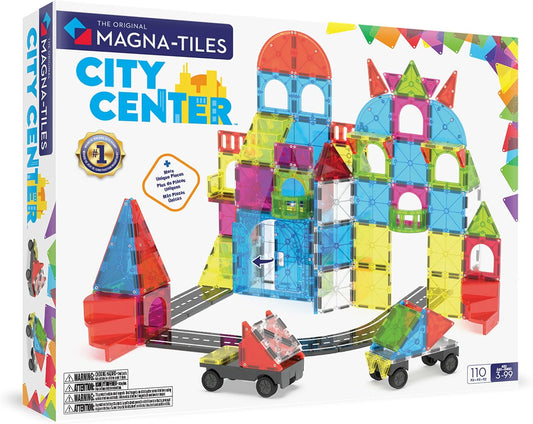 Magnetic construction tiles built into colorful town buildings and a street scene