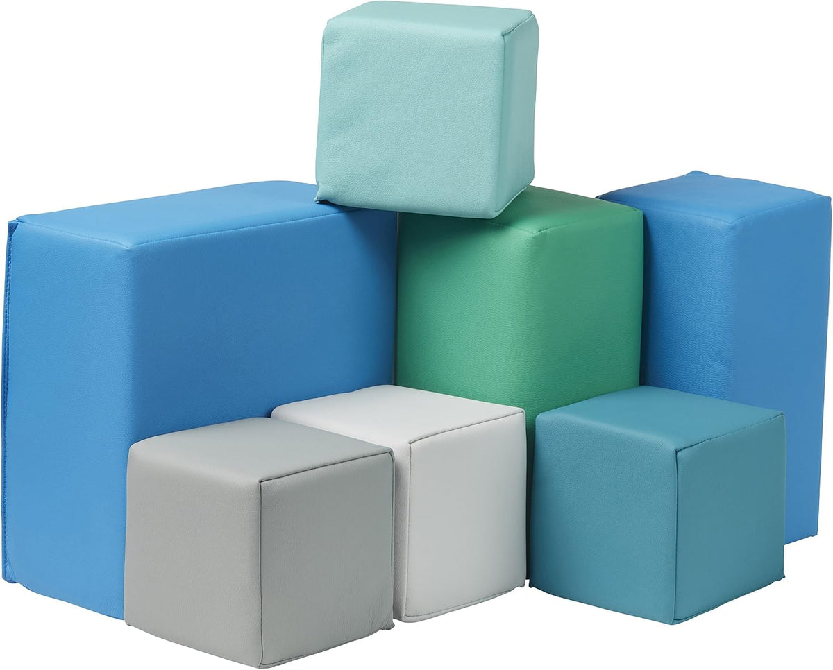 Seven soft foam toddler blocks in muted contemporary colors arranged as a playset
