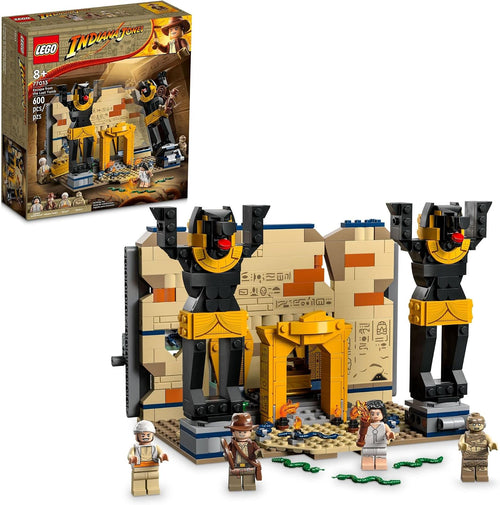 Brick-built ancient tomb with toppling statue, snakes and adventurer figures