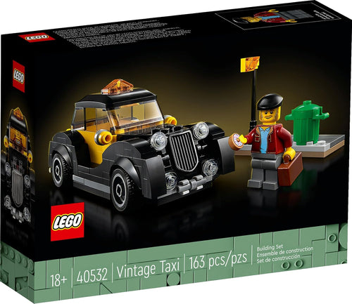 Small brick-built vintage taxi cab with rounded fenders