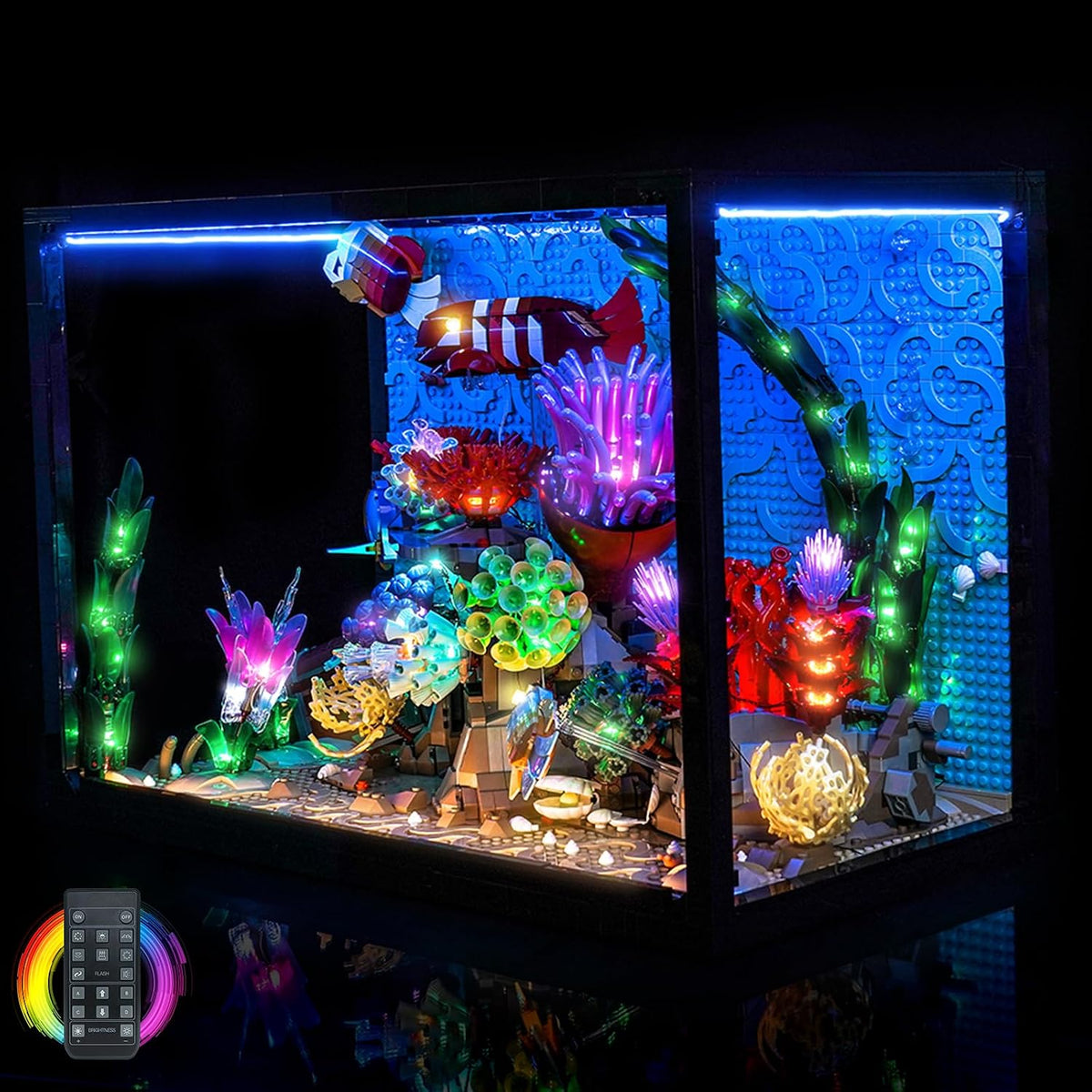 Tropical aquarium brick model with coral and fish lit by LED lights