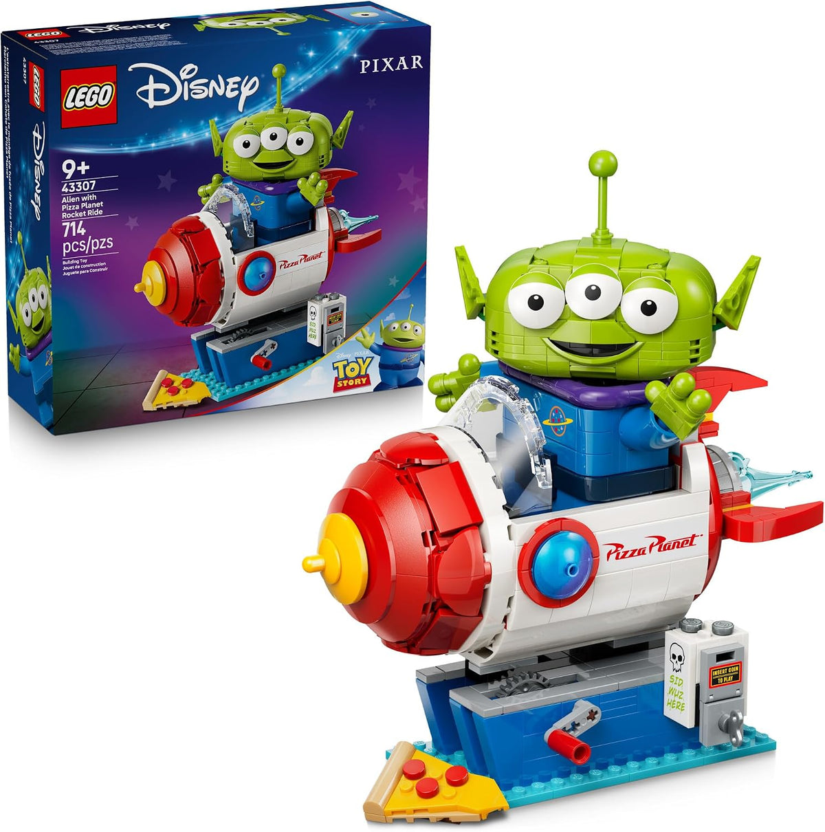 Green three-eyed brick alien sitting in a red and blue rocket ride machine