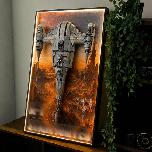 Wall-mounted display board with color LED backlight holding a starfighter model