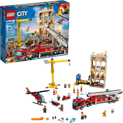 Brick-built fire trucks and firefighters tackling a burning downtown building – view 2