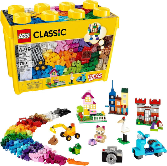 Two large brick boxes with colorful bricks, windows, wheels and green baseplates