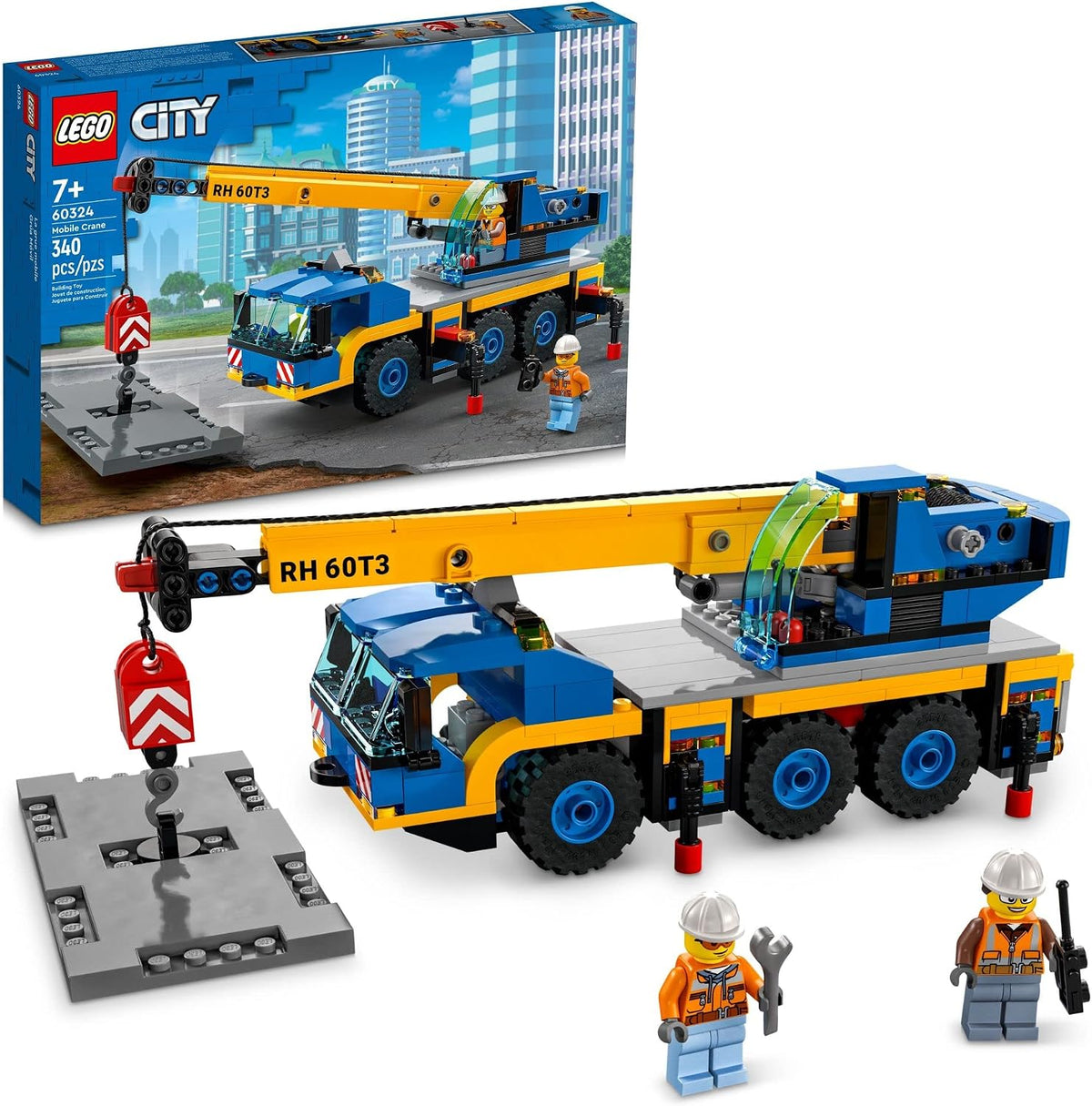 Yellow brick-built mobile crane truck with extended boom on a road plate with figures