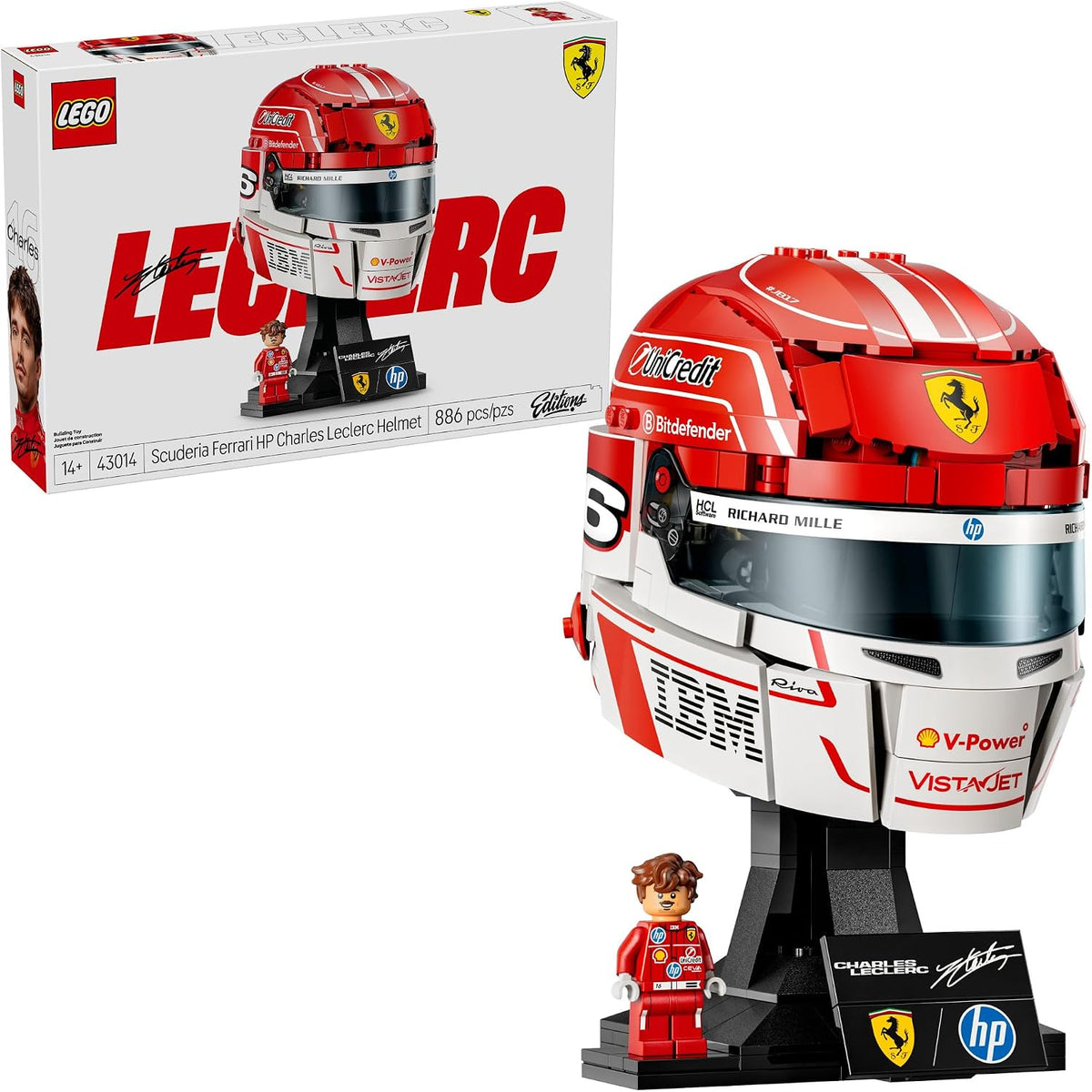 Brick-built racing red driver helmet model with printed graphics on a stand