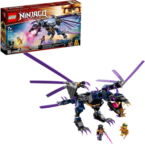 Built posable dragon model with spread wings beside a golden ninja minifigure