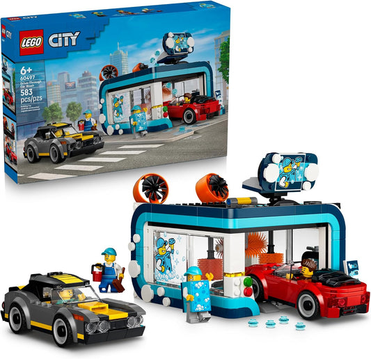 Brick-built drive-through car wash with brushes and a convertible rolling through