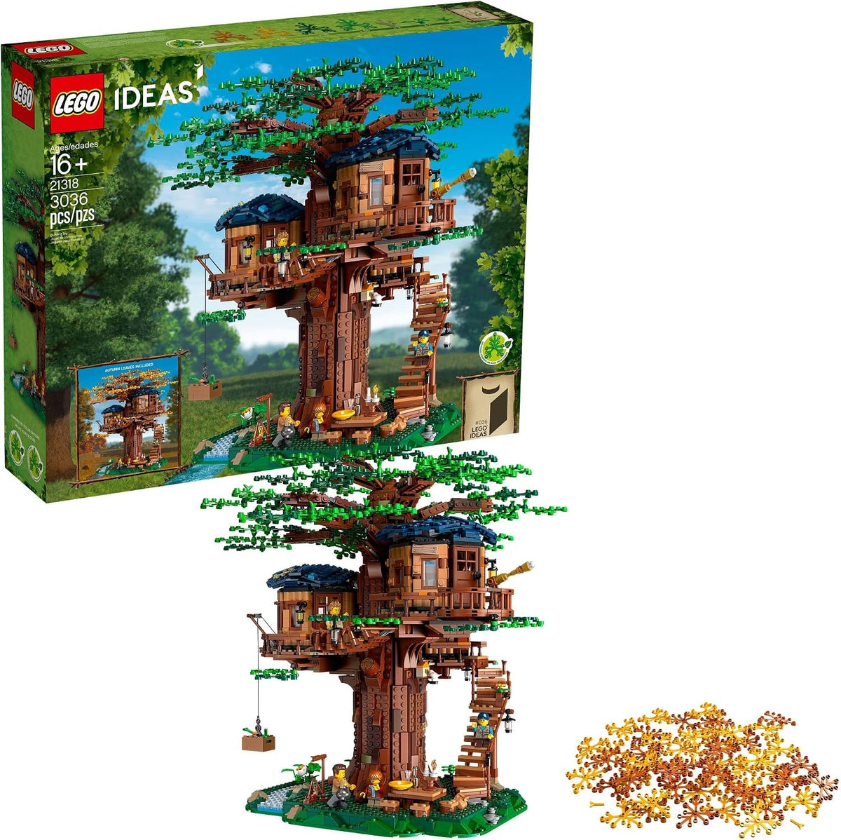 Built tree house brick model with three cabins and green leaves on a landscaped base