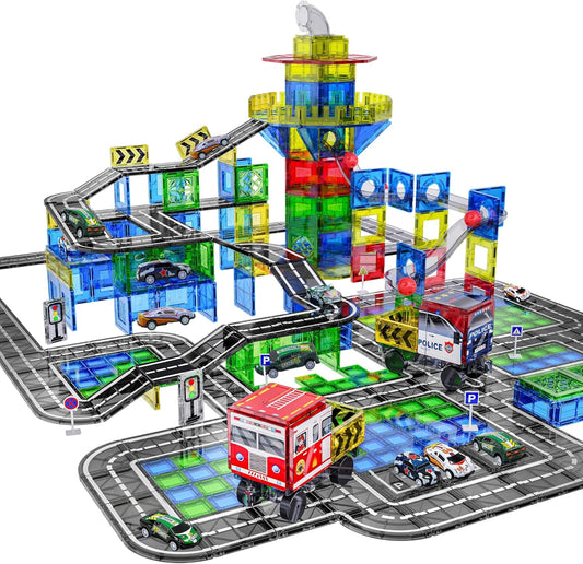 Magnetic tiles built into a road ramp and marble run with toy cars