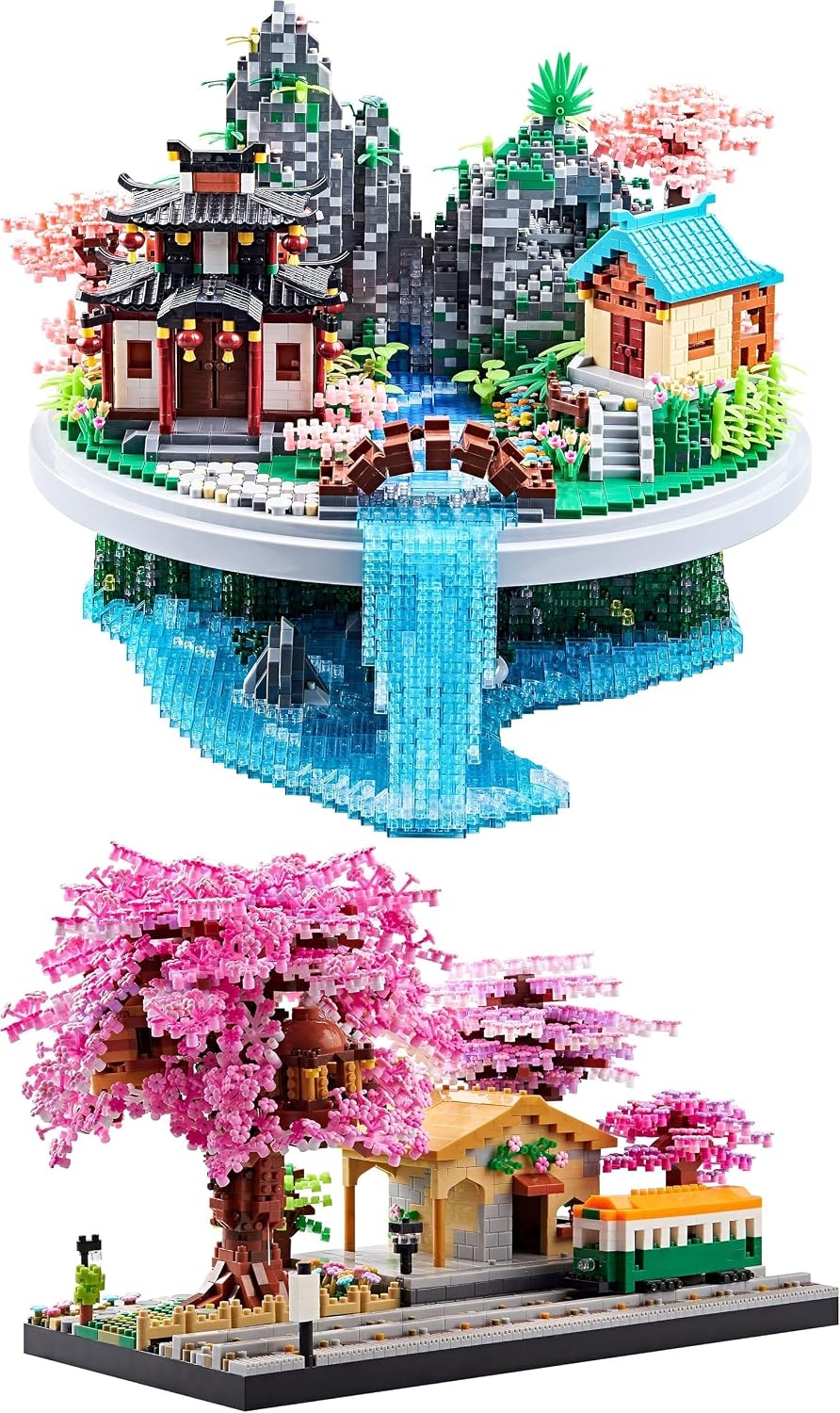 Micro-block Chinese village with pink peach trees beside a cherry blossom train station