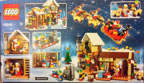 Snowy Santa's workshop building with clock tower, sleigh, reindeer and elf minifigures
