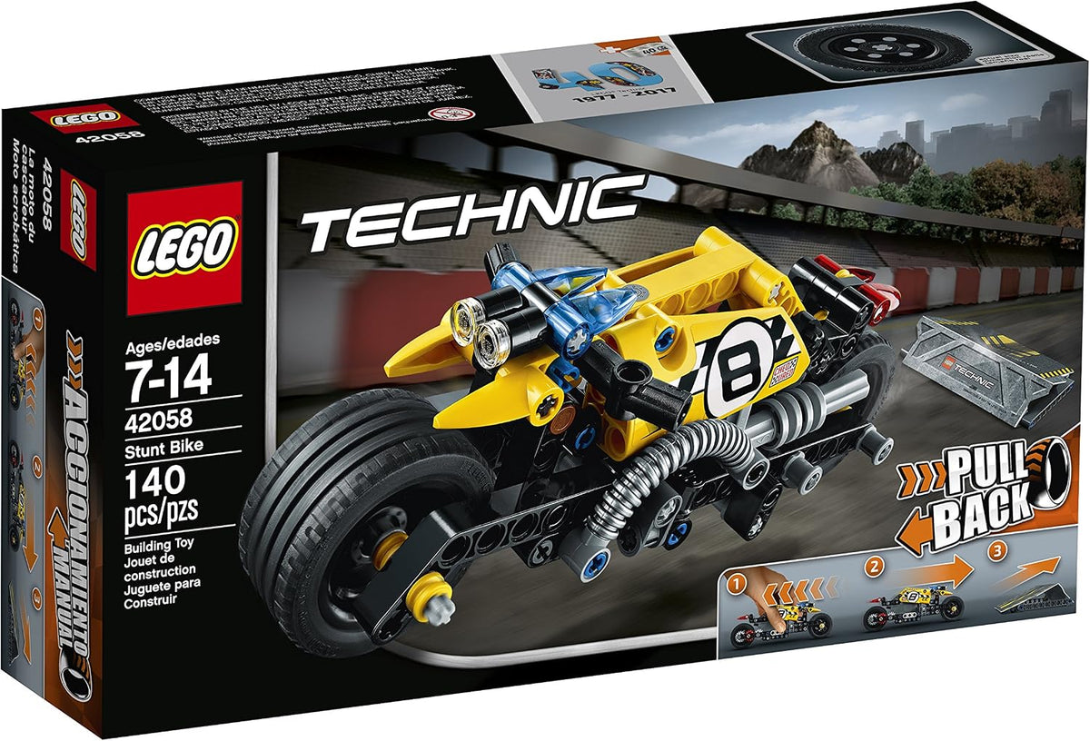 Yellow and black brick-built stunt motorcycle jumping off a small ramp