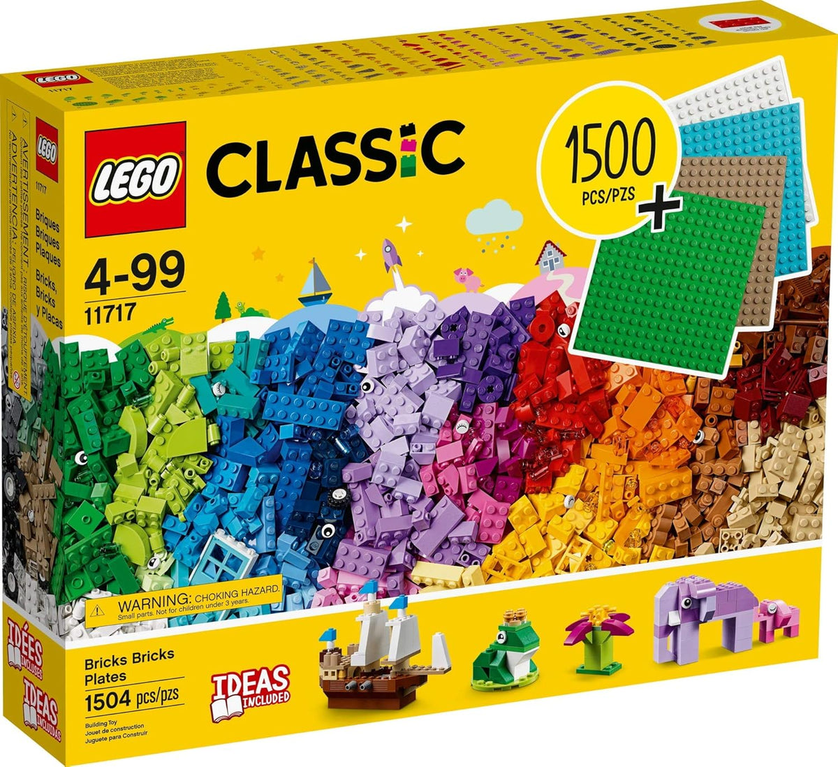 Assorted colorful bricks spilling from a large box with four baseplates