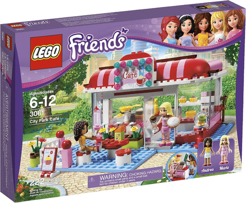 Built park café with outdoor dining tables and two mini-doll figures
