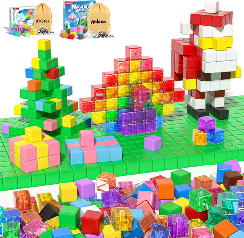Colorful magnetic building cubes stacked into towers beside a storage bag