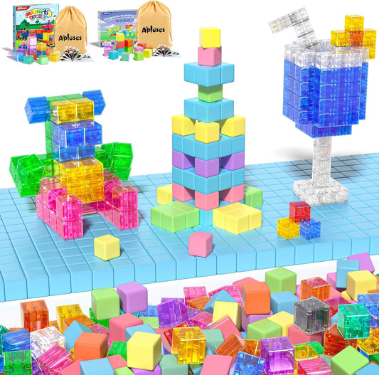 Colorful magnetic blocks built into a house and tower on a playroom floor