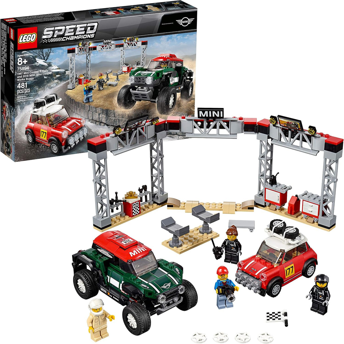 Brick-built vintage rally car and modern off-road buggy beside a pit stop station